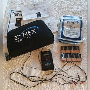 Zynex Medical TENS Unit W/ 17 Pad Sets & 8 9V Batteries
